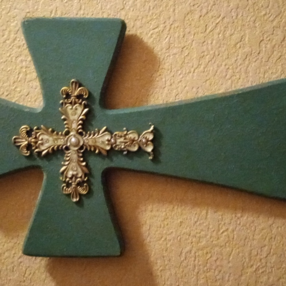 A very beautiful cross mounts on the wall goes very well with any room decor